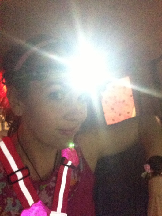Lit up for my night run. How cute is the pink Amphipod flower and vest?!?